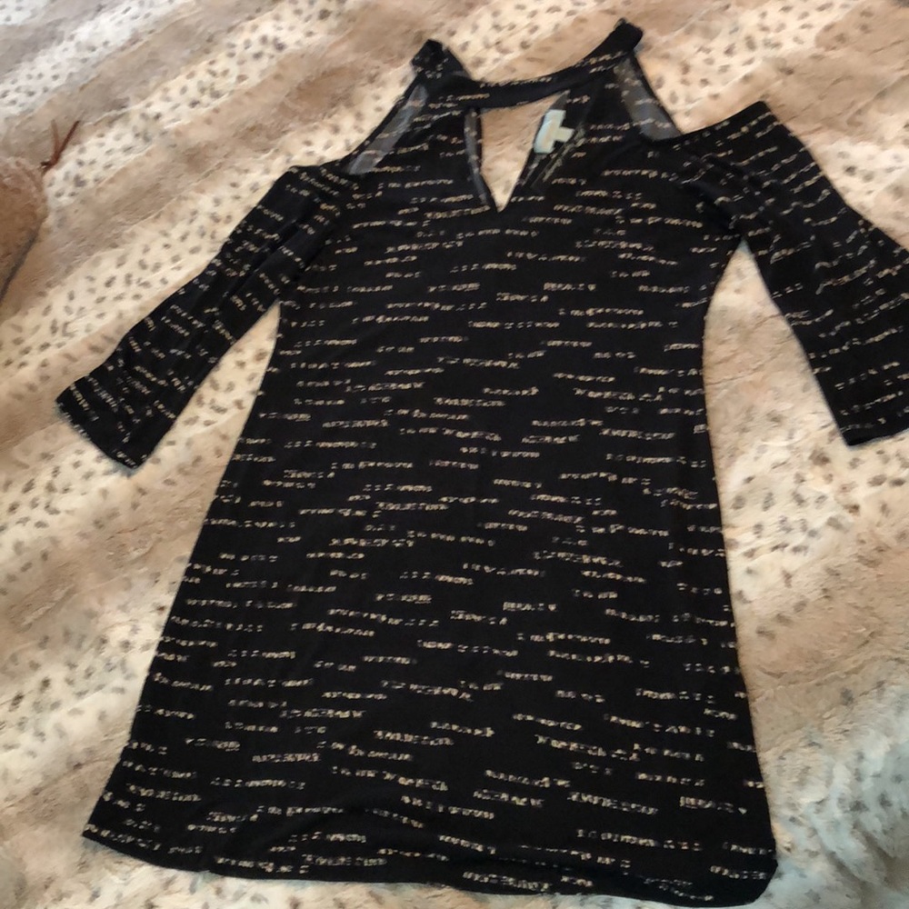 Dress in excellent condition. Never worn NWT